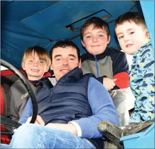  ?? Photo by Michelle Cooper Galvin ?? Owen, Oisin and Daniel Teahan with Sean Campbell participat­ing in the Charity Tractor Run from the Red Fox on Sunday.