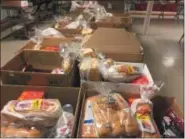  ?? PHOTO PROVIDED ?? Some of the rolls that are being donated to local families at Hope 7Food Pantry.