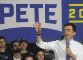  ?? Timothy A. Clary / AFP / Getty Images ?? Presidenti­al candidate and former South Bend, Ind., Mayor Pete Buttigieg speaks at a campaign rally in Keene, N.H. The primary takes place Tuesday.