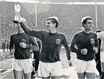  ??  ?? Bobby Moore, Martin Peters (with the Jules Rimet trophy) and Geoff Hurst after England’s 4-2 victory over West Germany in the World Cup final at Wembley, 1966; right, Peters scores England’s second goal; below, in action for West Ham in 1968