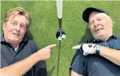  ??  ?? Peter Orton and Wayne Eagling next to the hole after they landed back-to-back holes in ones at Richmond Golf Club in south-west London