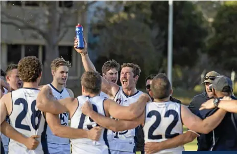  ?? Photo: Nev Madsen ?? GRAND FINAL BOUND: The Coolaroo playing group celebrates its preliminar­y final victory over Warwick at the weekend.