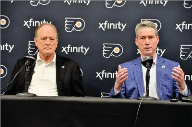  ?? SUBMITTED PHOTO — ZACK HILL ?? Flyers CEO Dave Scott, left, with general manager Chuck Fletcher earlier this season, said last year that turning the team around starts with him.