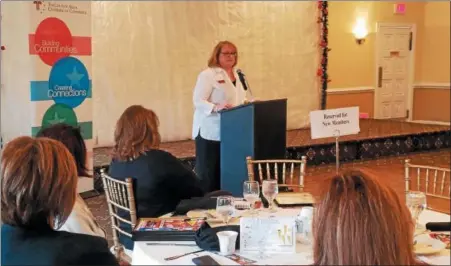  ?? DONNA ROVINS — DIGITAL FIRST MEDIA ?? Laura Otten, Ph.D., director of the Non Profit Center at La Salle University’s School of Business, speaks Thursday at the TriCounty Area Chamber of Commerce Breakfast. Otten talked about corporate social responsibi­lity and how important it is for...