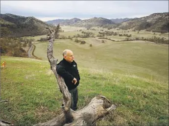  ?? Rich Pedroncell­i Associated Press ?? GOV. JERRY BROWN surveys his ranch in rural Colusa County. The governor, who will leave office Jan. 7, will turn his efforts to blocking a 2020 ballot measure that would rewrite parts of his parole overhaul.