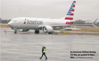  ?? LM OTERO/AP FILE PHOTO ?? An American Airlines Boeing 737 Max jet parked in Tulsa, Okla.