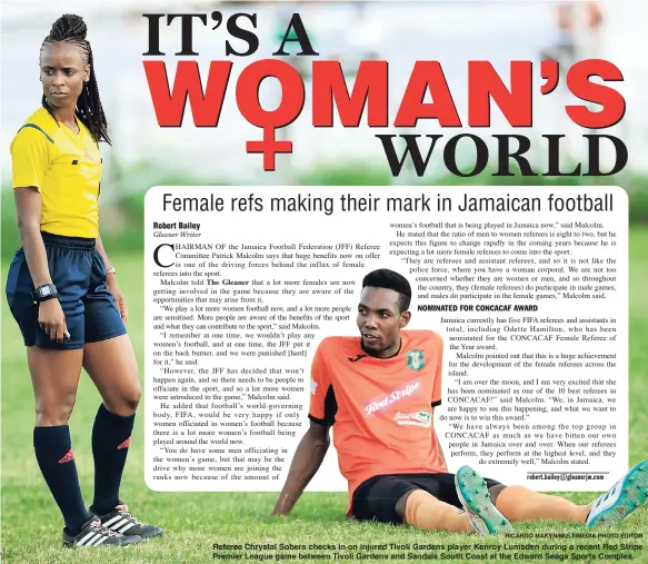  ?? RICARDO MAKYN/MULTIMEDIA PHOTO EDITOR ?? Referee Chrystal Sobers checks in on injured Tivoli Gardens player Kenroy Lumsden during a recent Red Stripe Premier League game between Tivoli Gardens and Sandals South Coast at the Edward Seaga Sports Complex.