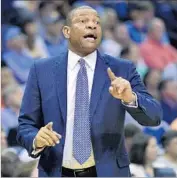  ?? Brandon Dill Associated Press ?? CLIPPERS COACH Doc Rivers is in the third year of a five-year deal worth more than $50 million.
