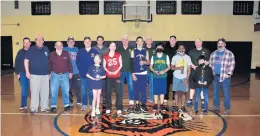  ?? FATHER PEREZ KNIGHTS OF COLUMBUS ?? Knights of Columbus members stand with free throw contest winners, from left, Avery Dunn, Nora Dunn, Amari Dawson, Chris Ortiz, Jerry Bolar and Daniel Diaz after the competitio­n earlier this month at St. Bendict School in Blue Island.