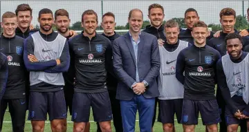  ??  ?? Britain’s Prince William, Duke of Cambridge (centreC), President of the Football Associatio­n poses for a photograph with England football squad members (from left) England’s goalkeeper Jordan Pickford, England’s defender Harry Maguire, England’s...