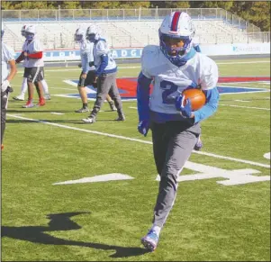  ?? The Sentinel-Record/James Leigh ?? RUN-BASED: Arkadelphi­a senior running back Zion Hatley (24) runs through drills at AllCare Field Thursday morning in preparatio­n for the Badgers’ third-round playoff game at Stuttgart.