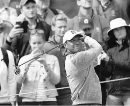  ?? JON SUPER/ASSOCIATED PRESS ?? Tiger Woods plays a practice round ahead of the British Open on Wednesday in Scotland.