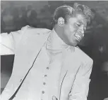  ?? THE COMMERCIAL APPEAL FILES ?? James Brown performs before an audience of 11,733 at the Mid-south Coliseum on 24 Aug 1968. The Augusta, Georgia, singer sang his way to the top of the musical heap as Soul Brother No. 1.
