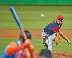  ?? THE ASSOCIATED PRESS ?? Atlanta Braves pitcher Kevin Gausman delivers during the first inning of Sunday’s game in Miami. Gausman has won four straight starts.
