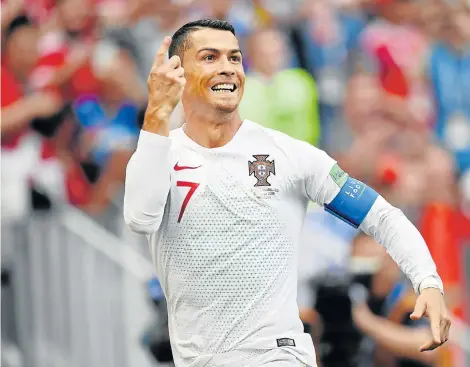  ?? Picture: STUART FRANKLIN/GETTY IMAGES ?? GOAL WIZARD: Cristiano Ronaldo of Portugal celebrates after scoring his team’s only goal during the World Cup Group B match against Morocco at the Luzhniki Stadium in Moscow yesterday. Morocco are now out the tournament