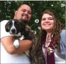  ?? COURTESY OF KAYLA QUALES ?? Joseph and Kayla (Dieter) Quales of Albany Township, with their dog, Lilly, before her death in November 2013. Lilly was a border collie and pointer mix the Quales said.