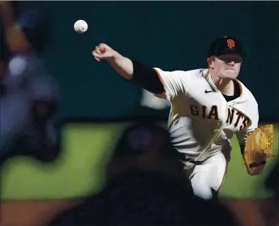  ?? KARL MONDON — BAY AREA NEWS GROUP, FILE ?? Giants pitcher Logan Webb pitches against the Mariners’ Luis Torrens in the fourth inning at Oracle Park in San Francisco on Sept. 8.