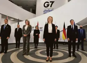  ?? Paul Ellis / Getty Images ?? British Foreign Secretary Liz Truss (center front) hosts top diplomats from G-7 nations, including U.S. Secretary of State Antony Blinken (right front).