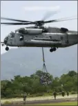  ?? AP PHOTO/WONG MAYE-E ?? In this Oct. 10, 2009, file photo, a U.S. military helicopter, the CH-53E Super Stallion is pictured. On Tuesday a CH53E Super Stallion went down during a training mission near El Centro.