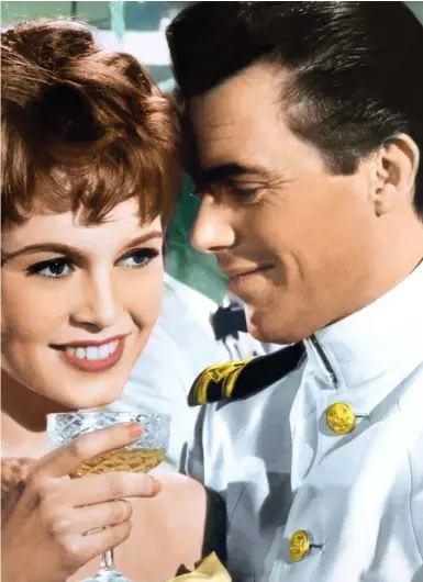  ??  ?? Doctor in love? Bogarde with Brigitte Bardot in Doctor at Sea (1955)