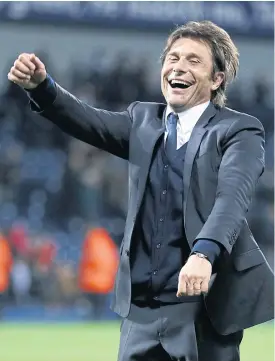  ??  ?? Chelsea manager Antonio Conte celebrates winning the Premier League title.