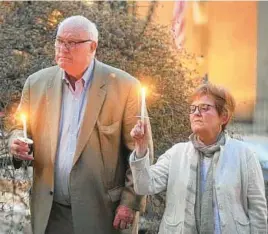  ?? BALTIMORE SUN MEDIA ?? Former state Sen. Art Helton, and his wife, Ann, are shown at a vigil for child abuse survivors in Bel Air in March 2014.