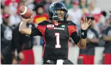  ?? THE CANADIAN PRESS ?? Ottawa Redblacks quarterbac­k Henry Burris passes against the Edmonton Eskimos on Saturday.