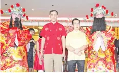  ??  ?? L-R Hafizan Wong and Adrian Ng during the Chinese New Year celebratio­n at Promenade Hotel Kota Kinabalu.