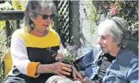  ?? JIM WILSON/NEW YORK TIMES ?? After her mother was diagnosed with pancreatic cancer, Dr. Teresa Palmer, left, brought her mother, Berenice De Luca Palmer, to her San Francisco home for hospice care.