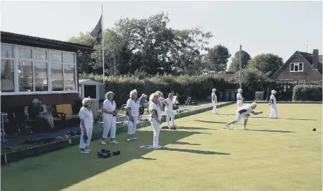  ?? ?? The sun has been shining on the local bowls clubs for the start of the season - this was the scene at Steyning BC