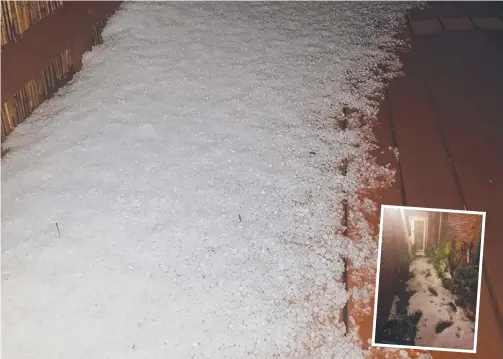  ?? Picture: JOHN BRUHN/FACEBOOK ?? Hail fell so thickly in some parts of the Coast it looked more like it had snowed.