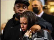  ?? (AP/Nicole Neri) ?? Daunte Wright’s parents, Aubrey Wright and Katie Wright, react after former Brooklyn Center police officer Kim Potter was sentenced to two years in prison Friday in Minneapoli­s.