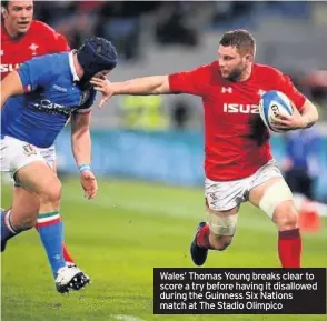  ??  ?? Wales’ Thomas Young breaks clear to score a try before having it disallowed during the Guinness Six Nations match at The Stadio Olimpico