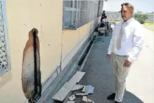  ??  ?? CRIME ONSLAUGHT: Deputy principal Freddie Mentoor shows where the latest breakin occurred at Van Der Kemp Primary