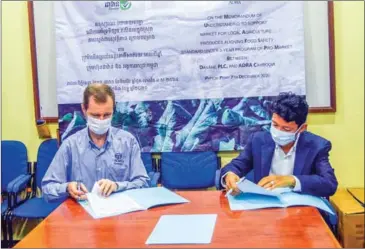  ?? SUPPLIED ?? Adra Cambodia and Davane signed an MoU on Monday to promote the domestic safe food market.