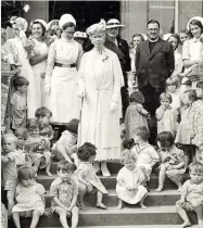  ??  ?? Queen Mary visits a Children’s Society nursery in the 1940s