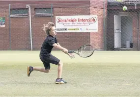  ??  ?? Young star Aaron Hodge in action on his way to the under-10 title