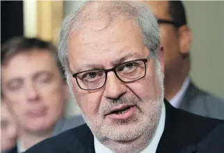  ?? JACQUES BOISSINOT/THE CANADIAN PRESS ?? Interim Liberal leader Pierre Arcand says government­s that have been in power for a long time have “a tendency to forget what the people want.”