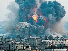  ?? MOHAMMED SABER/EPA PHOTO ?? Smoke billows from the Gaza Strip on Tuesday. The Israeli army said it had hit almost 300 targets across Gaza, which is controlled by the militant group Hamas.