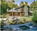  ??  ?? Logs and granite create a picture-worthy home on Lake of Bays in Muskoka.