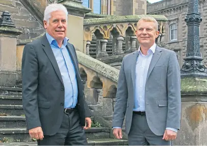  ?? Picture: Dougie Nicolson ?? Dundeecom’s Callum Falconer left, and Lee Johnson, chief executive of Offshore Decommissi­oning Services (ODS), in Dundee.