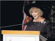  ??  ?? ACTRESS Ruta Lee speaks during the memorial service in Forest Lawn Memorial Park on Saturday.