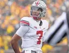  ?? ADAM CAIRNS/COLUMBUS DISPATCH ?? Being at the center of attention and dealing with high hopes of OSU fans were new experience­s for QB C.J. Stroud.