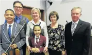  ?? Picture: SUPPLIED ?? SHARING JOY: The Grey High School String Band visited Riebeek College Girls’ High School last week to perform and educate the young pupils about instrument­al music. From left are Denovan Jemiker, Shawn Lyon, Riebeek College principal Kieran Stear, Teisha van Aardt, Grey High string orchestra conductor Marliza Taylor and Louis Potgieter