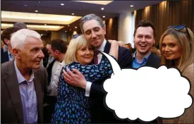  ?? ?? SIMON Harris embraced his mother Mary, flanked by his dad Bert, brother Adam and sister Gemma after becoming Fine Gael leader this week. But what was the incoming taoiseach saying? Our weekly competitio­n gives you the chance to write an amusing caption for a photo from the news. The best entry wins a €30 Eason token. Send your entries to Caption Competitio­n, Irish Daily Mail, Two Haddington Buildings, 20-38 Haddington Road, Dublin 4, D04 HE94 – or email captions@dailymail.ie. Entries should include your full name and address and arrive by Thursday, April 4. Previously, Leo Varadkar may be leaving the top job, but first he got to present the traditiona­l shamrock to the US president. We asked what the Taoiseach was saying to Joe Biden and the winning caption, below, came from Tony Fearon in Poyntzpass, Co. Down.