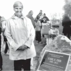  ?? [VERONICA REINER / THE OBSERVER] ?? A large crowd gathered in Wellesley village Saturday for the grand opening of Erbhaven Trails. Eva Erb, whose family donated the parcel of land, cut the ribbon to make it official at the site, which bears a memorial plaque dedicated to her late husband.