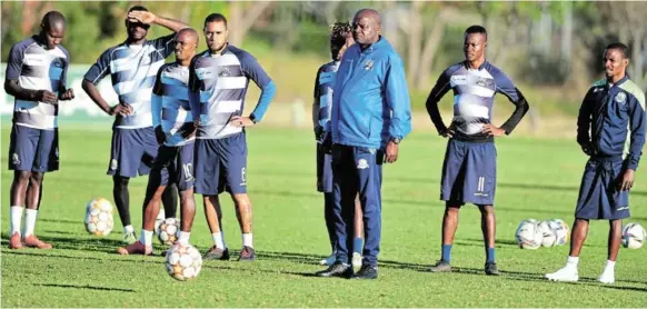  ?? KABELO LEPUTU/BACKPAGEPI­X ?? Marumo Gallants coach Dan Malesela with his players during a training session at Peter Mokaba Stadium in Polokwane earlier this year.