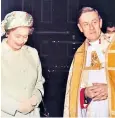  ??  ?? Caesar with the Queen in the 1980s: during his war service as a pilot he twice had to ditch into the North Sea when his plane, the ill-fated Avro Manchester bomber, suffered engine failure