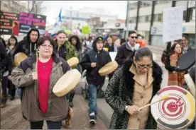  ?? Canadian Press file photo ?? Protesters show their support for Cindy Gladue at a rally along Edmonton’s streets on April 2, 2015.