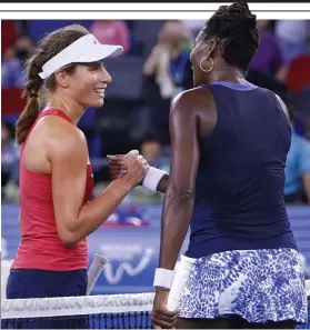  ??  ?? Plenty to smile about: Konta (left) is in superb form